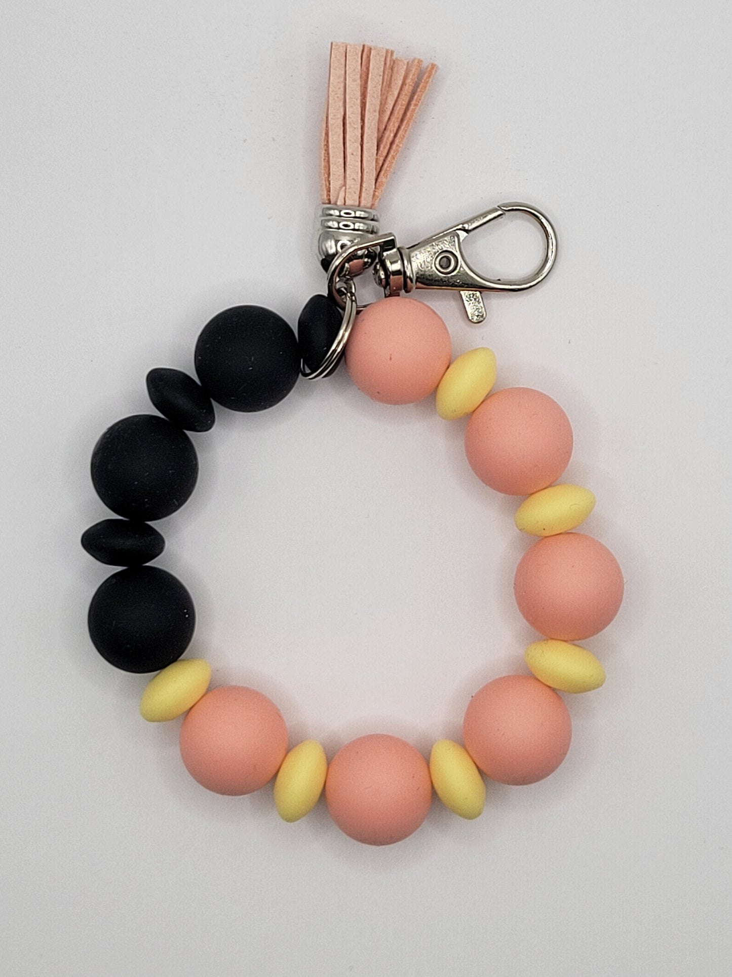 Peach, Pale Yellow, Black Wristlet