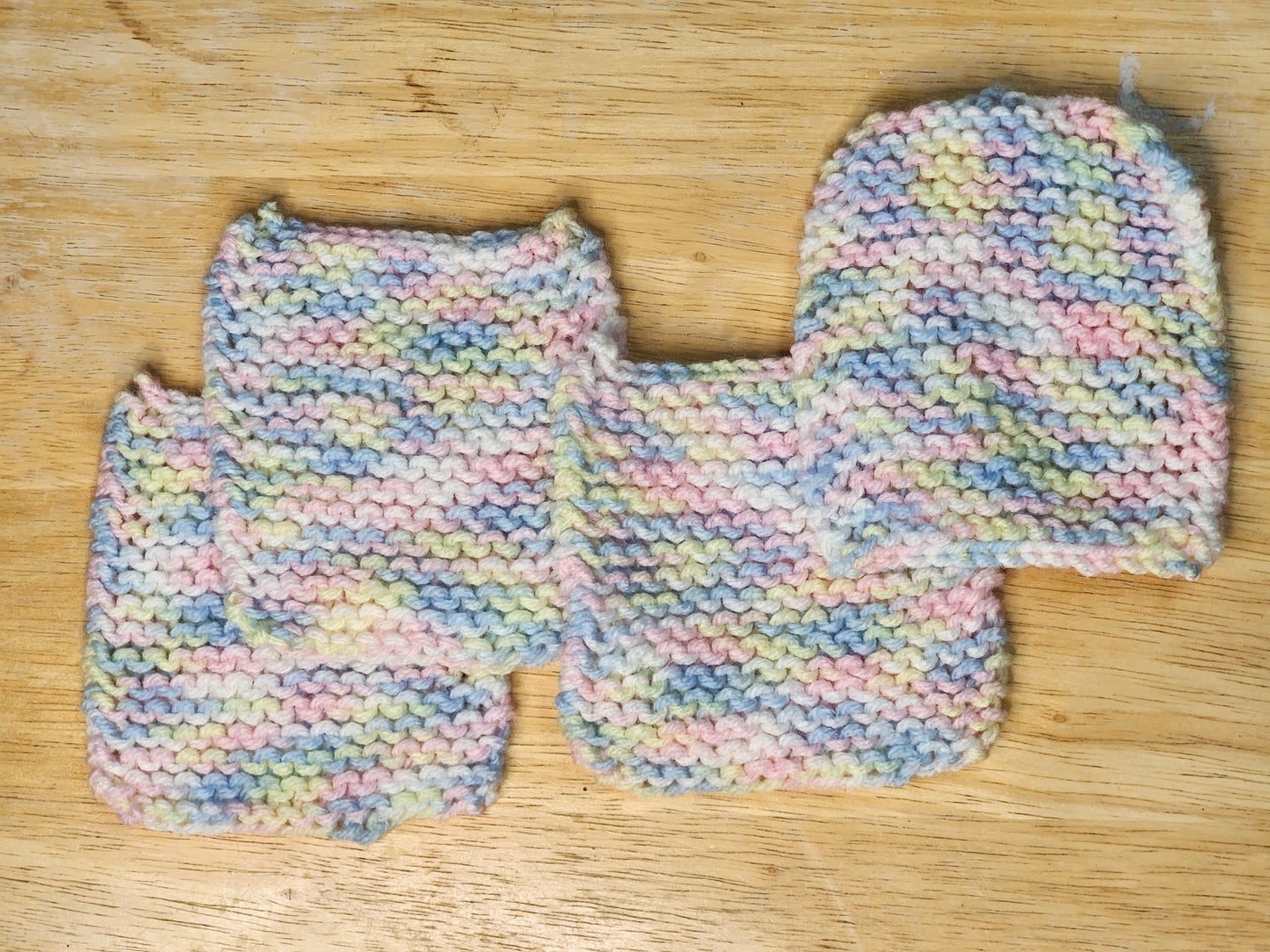 Pink, Yellow, and Blue Knitted Coaster Set