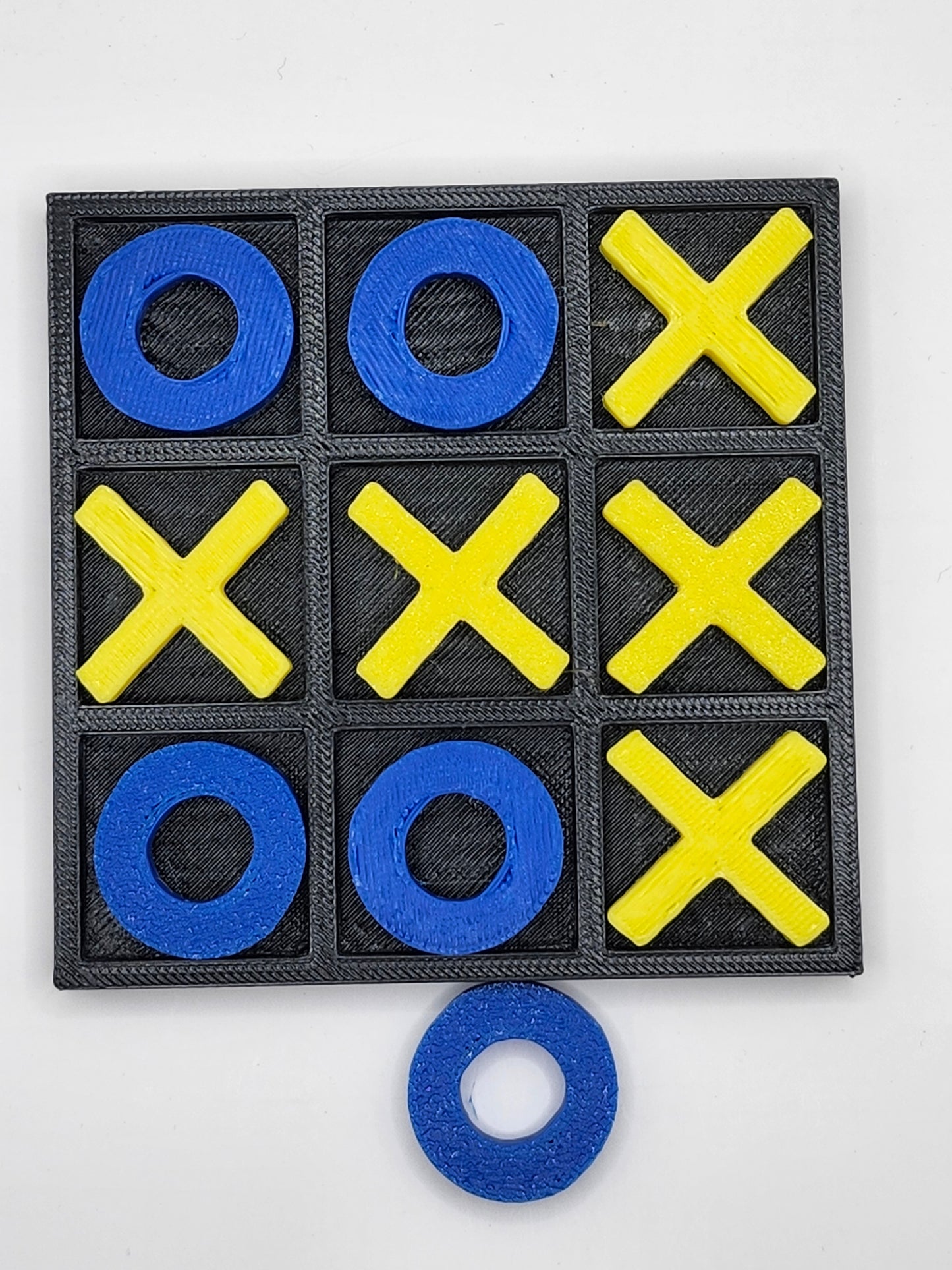 Blue and Yellow Tic Tac Toe Board