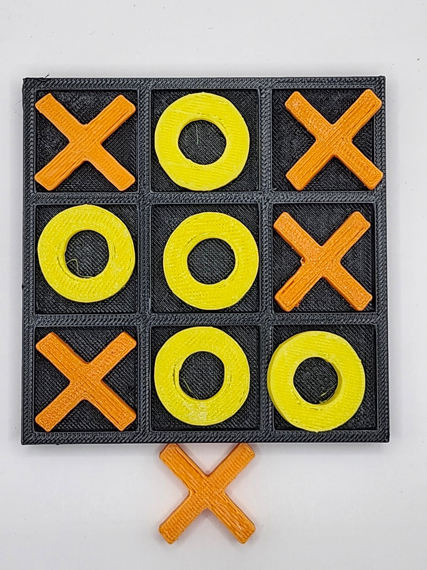 Orange and Yellow Tic Tac Toe Board