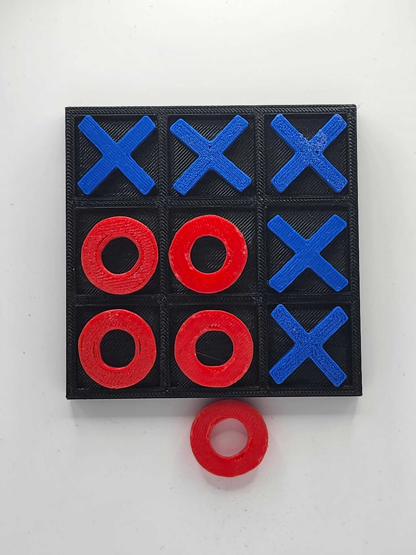 Red and Blue Tic Tac Toe Board