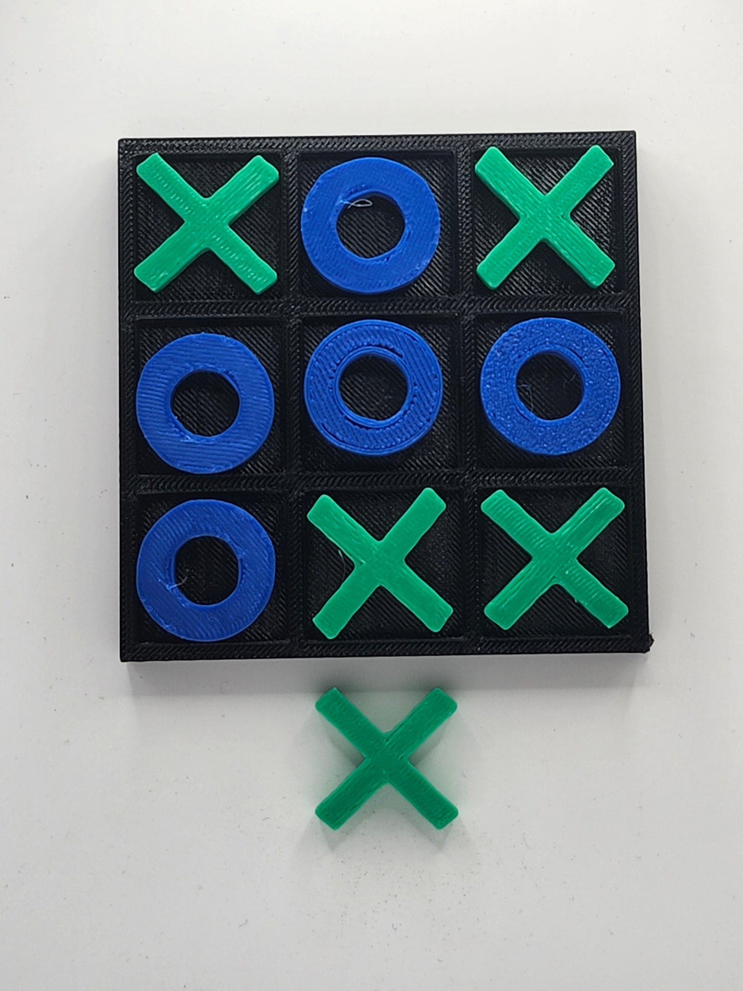 Blue and Green Tic Tac Toe Board